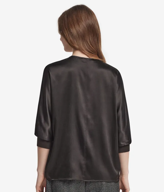 Blusa con scollo a V in seta