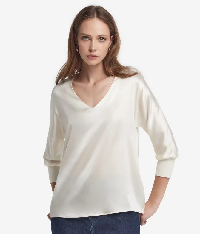 Blusa con scollo a V in seta