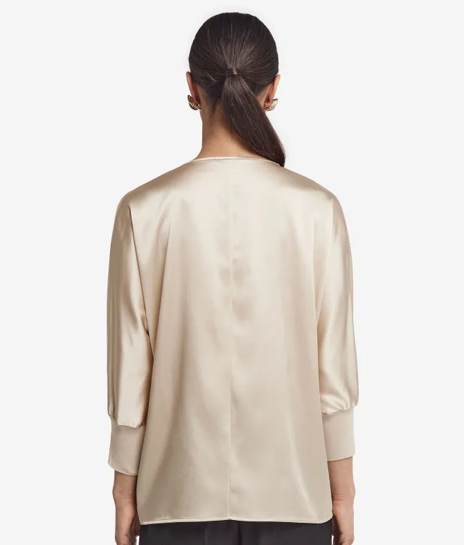 Blusa con scollo a V in seta