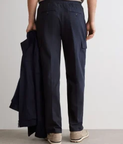 Pantalone tasconato in cotone e lino