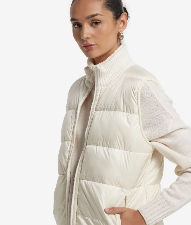 Piumino smanicato reversibile in bouclé