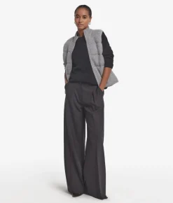 Piumino smanicato reversibile in bouclé