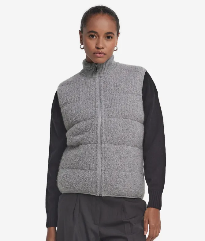 Piumino smanicato reversibile in bouclé