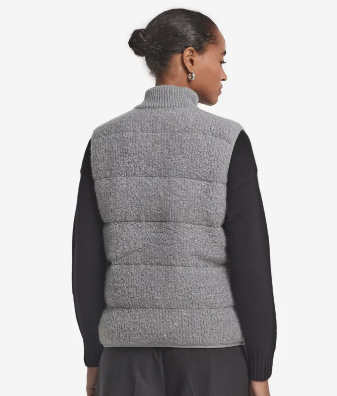 Piumino smanicato reversibile in bouclé