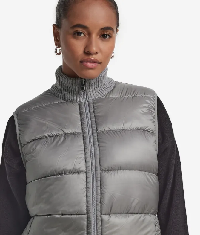 Piumino smanicato reversibile in bouclé