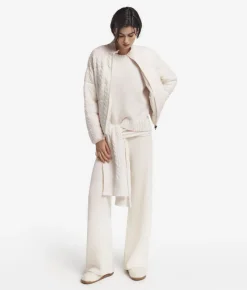Piumino trecce reversibile in cashmere e tessuto tecnico