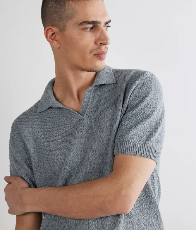 Polo bouclè in cotone